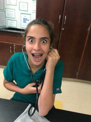 Pre-Med Student in Stethoscope Lab